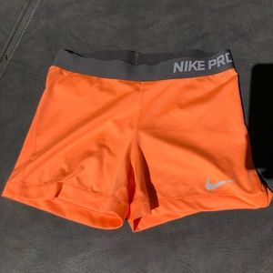 Orange Nike Pros